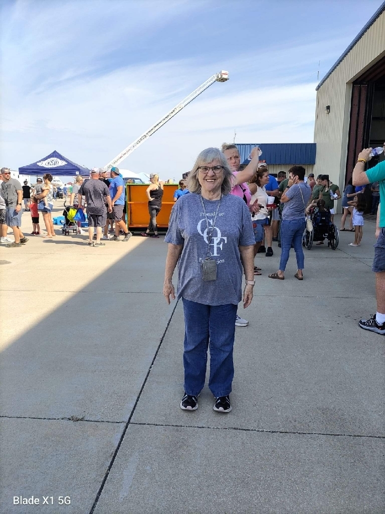 Margaret at plane pull with great smile